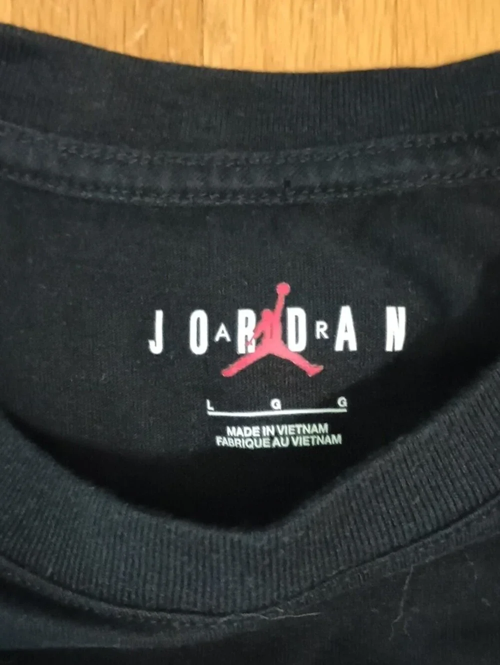 Jordan Men’s Black Tee with Blue Plaid Logo and Gold Jumpman
